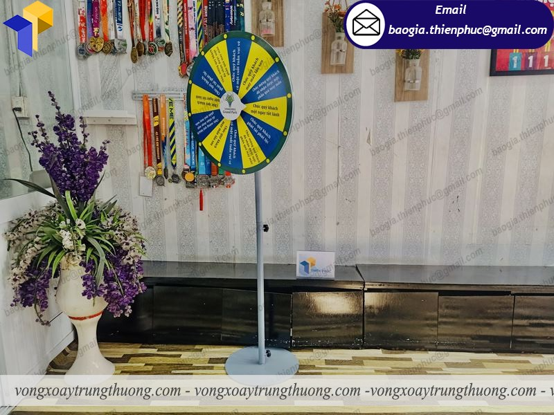 đặt mua vòng quay trúng thưởng chân đứng