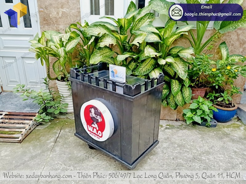 thiết kế tủ bán trà sữa bằng gỗ thông